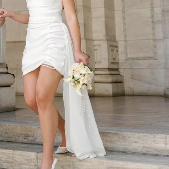 Elegant White Dress with Pearl Details - www.rajagirimanappuram.com Elegant White Dress with Pearl Details - www.rajagirimanappuram.com